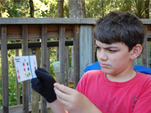 student looking at results of pH test kit