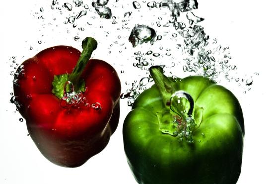 Vegetables dropped in water 