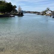 Seawalls and houses on the banks of the upper bay
