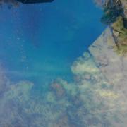 The vents are visible through the clear water