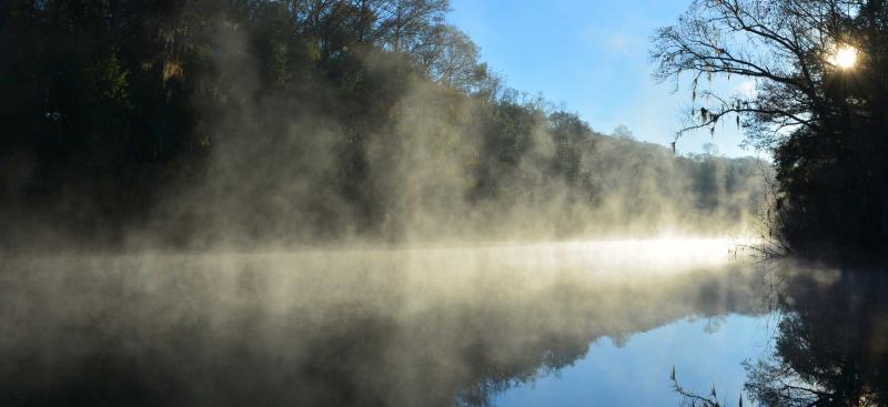 steamy fog rising off of river 