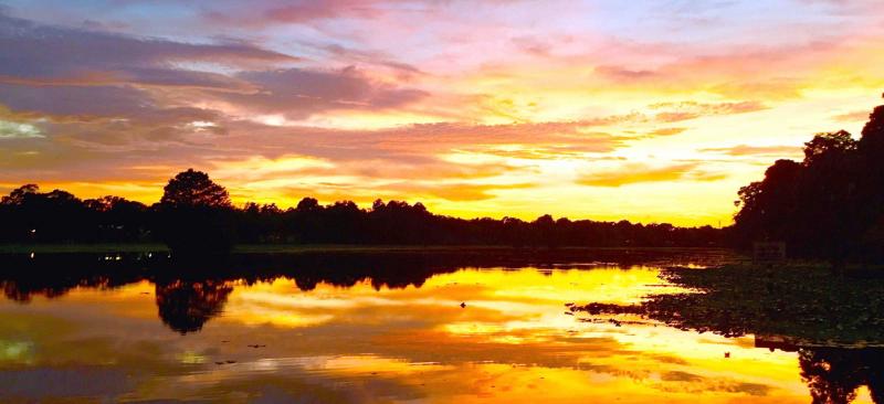 sunset over water body