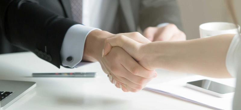 business people shaking hands