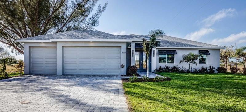 Florida home with garage and front yard