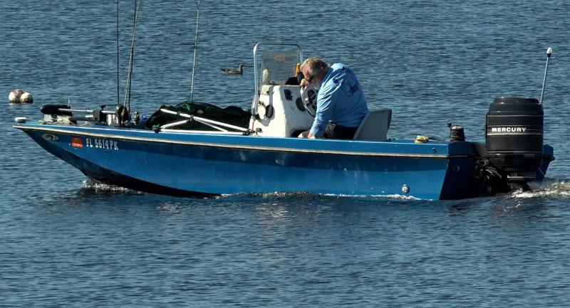 Small boat on the Alafia River on a sunny day