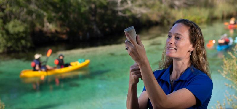 District staff taking water quality samples