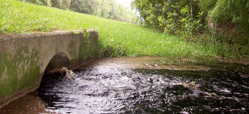 stormwater culvert with water flowing out