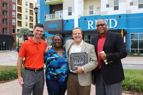 Group Shot with Plaque