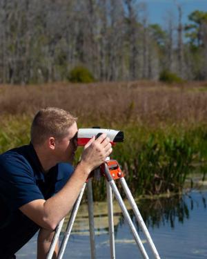 Mark Fulkerson surveying wetlands