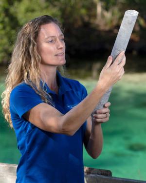 Professional Geologist Kristina Mallams examining samples on the Weeki Wachee.