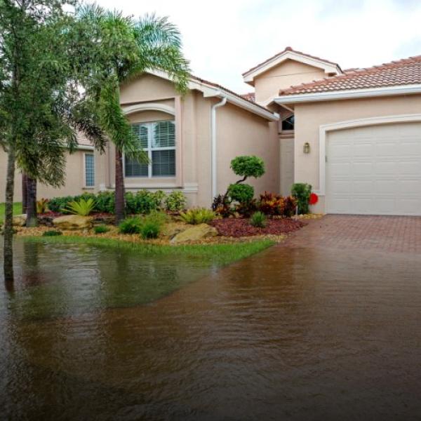 Florida home with flooding in the front yard