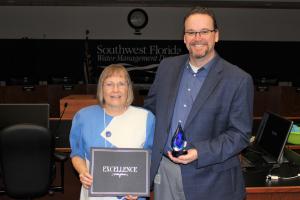 Brian Armstrong and Carol with awards