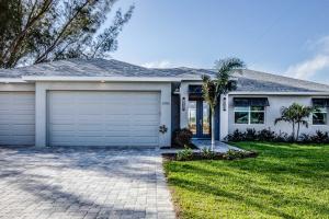 Florida home with garage and front yard