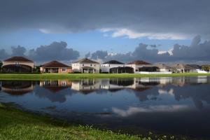 A new development of homes on a retention pond
