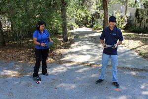 Two District staffers testing for water leaks