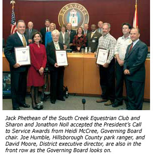 Volunteers accepting awards