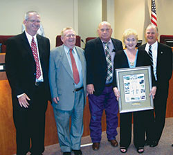 Patricia Glass accepting plaque