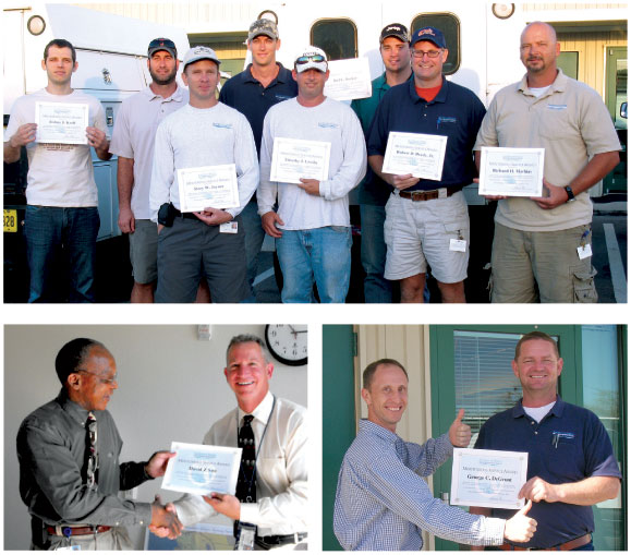 Staff receiving their awards