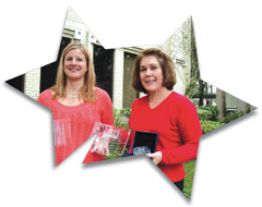 Kendra Antoine and Sylvia Durell, senior communications coordinators, with their Crystal Awards.