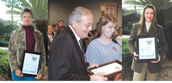 Volunteers accepting awards