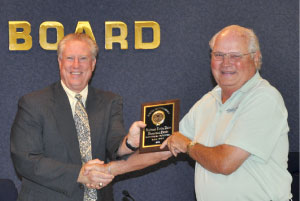 Richard Shirley presenting award to Doug Tharp