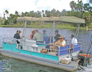 District staff and Governing Board and Basin Board members on boat